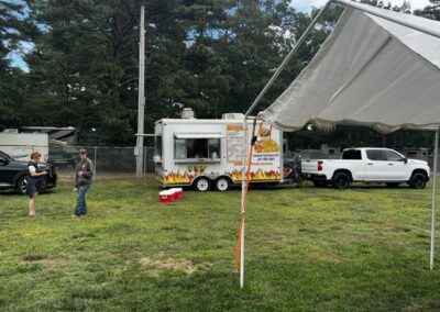 Rows of cornhole boards at the Plymouth County CISM fundraiser