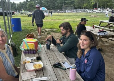 Picnic tables full of supporters at the fundraiser