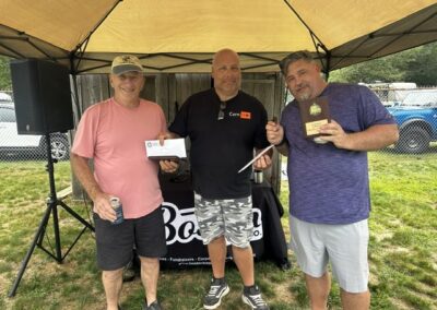 The winning cornhole team at the Plymouth County CISM fundraiser